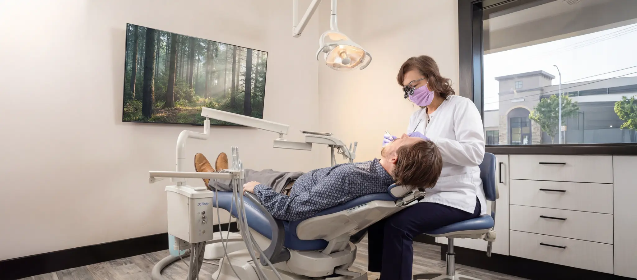 Dr. Cifor providing dental care